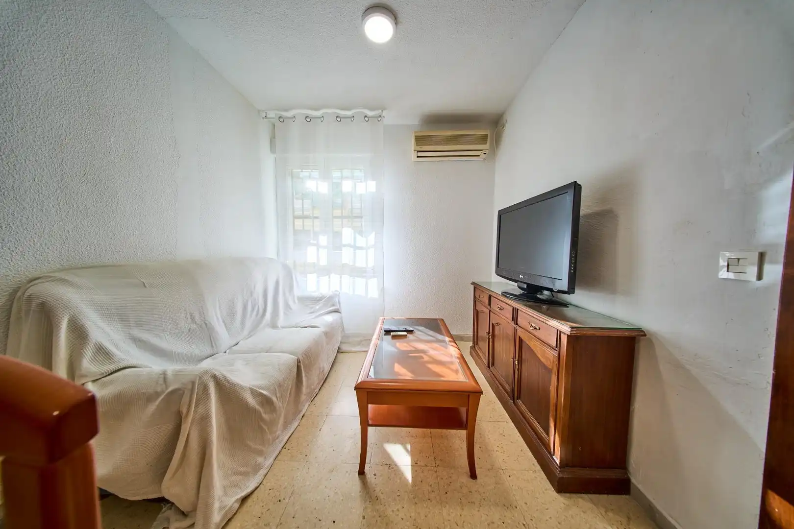 Sala de estar de Piso para compartir en Granada con Amueblado