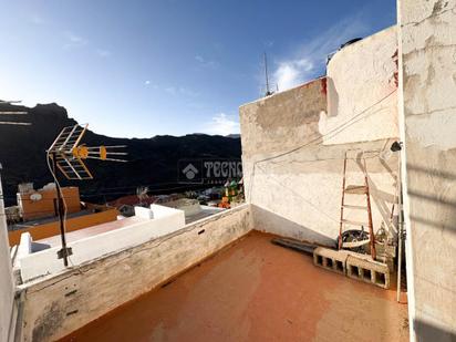 Vista exterior de Casa adosada en venda en Mogán amb Aire condicionat, Terrassa i Balcó