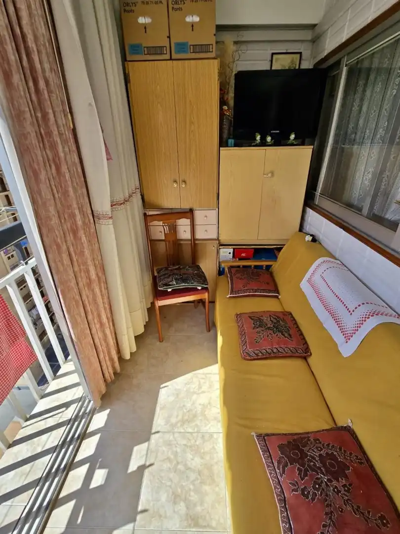 Sala de estar de Apartamento en venta en Benidorm con Aire acondicionado, Terraza y Piscina comunitaria