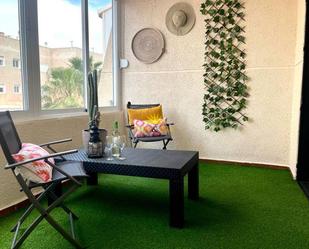 Terrassa de Apartament de lloguer en Torrevieja amb Aire condicionat, Piscina i Balcó