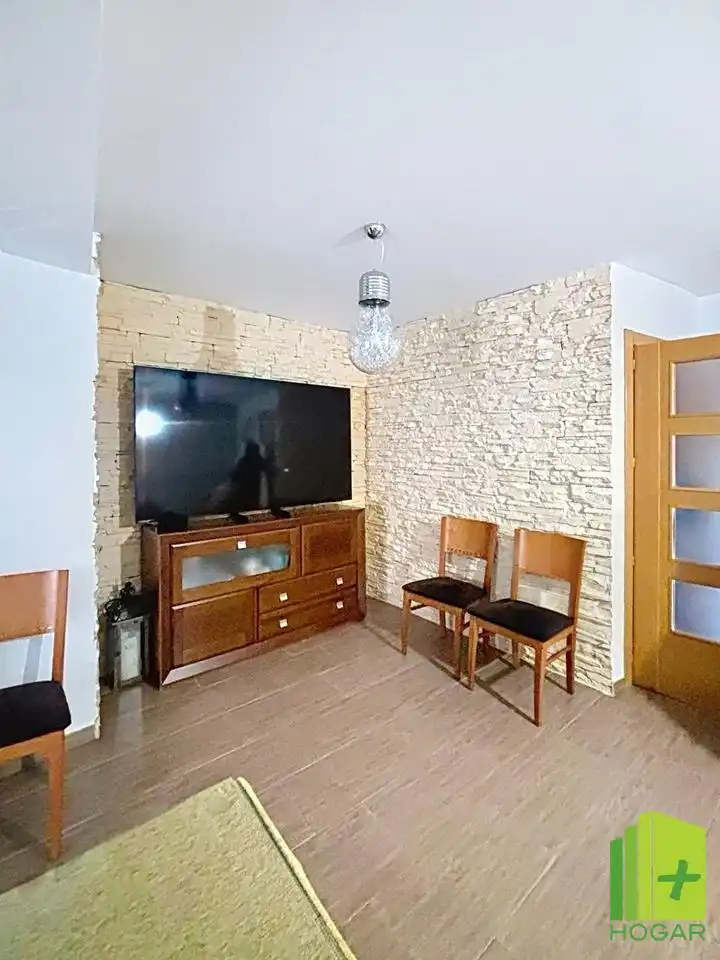 Sala de estar de Casa adosada en venta en Jaén con Aire acondicionado, Terraza y Balcón