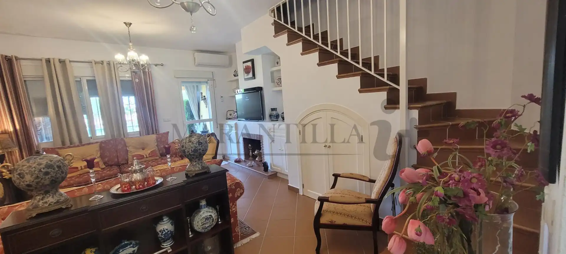 Sala de estar de Casa adosada en venta en Islantilla con Aire acondicionado, Calefacción y Jardín privado