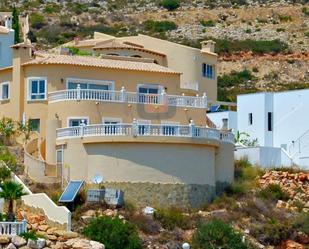 Exterior view of House or chalet for sale in Benitachell / El Poble Nou de Benitatxell  with Air Conditioner, Heating and Private garden