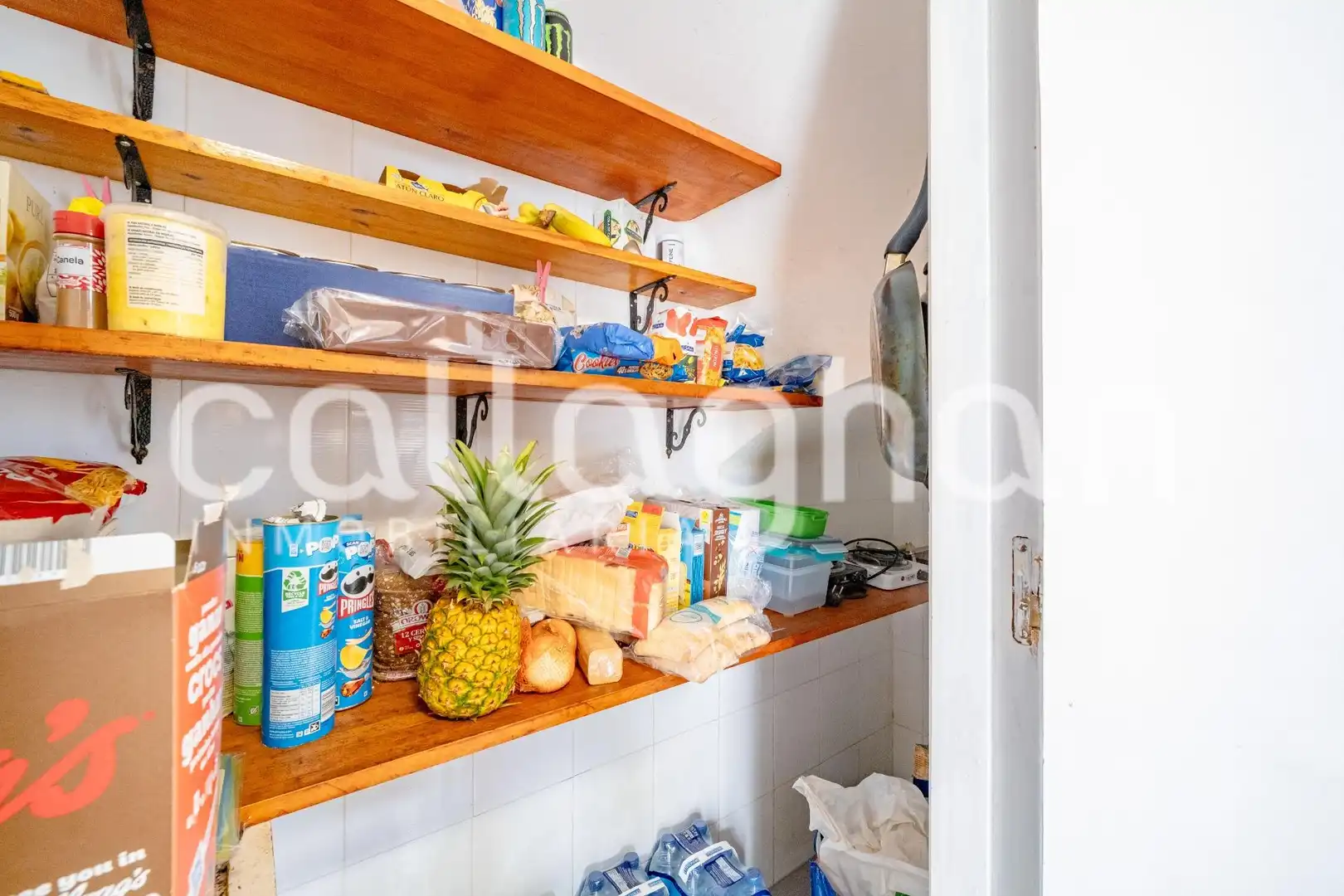 Cuina de Casa adosada en venda en Sagunto / Sagunt amb Aire condicionat, Calefacció i Jardí privat