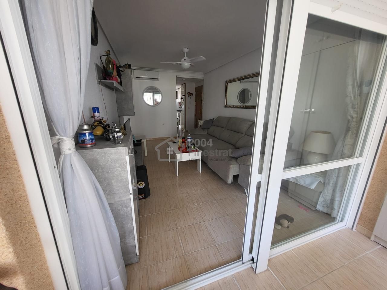 Living room of Flat for sale in Finestrat  with Air Conditioner, Terrace and Furnished