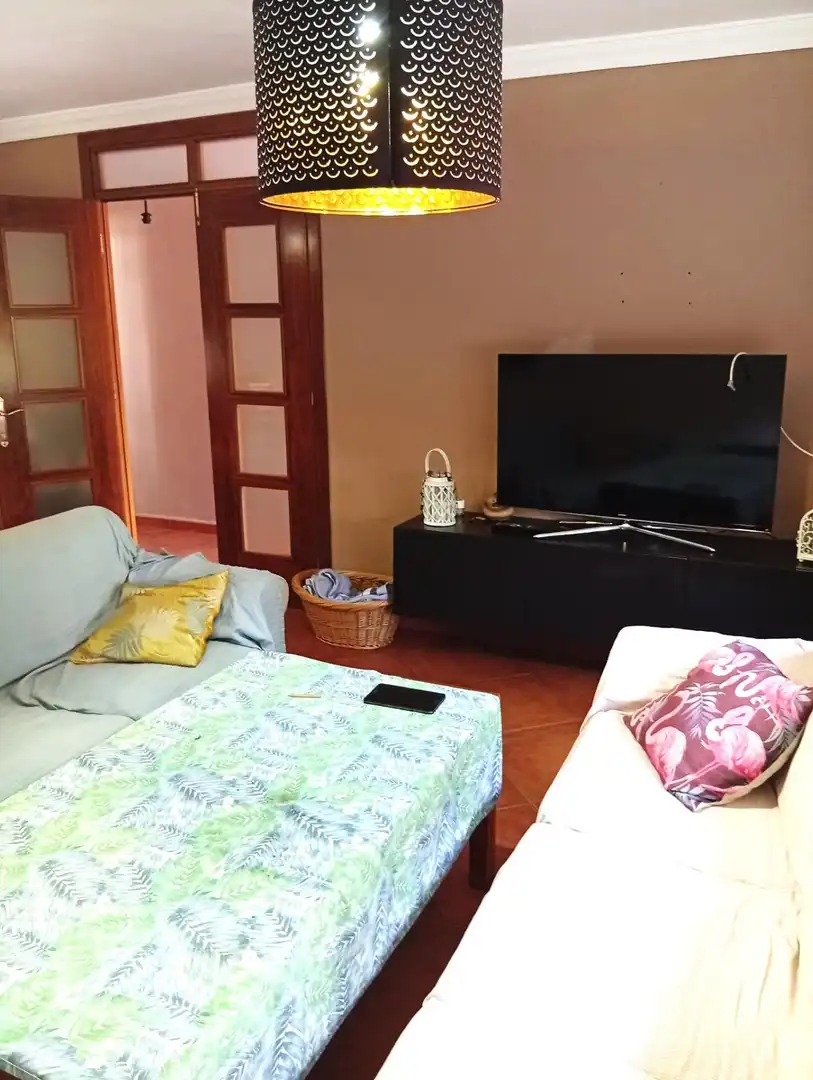 Sala de estar de Casa adosada en venta en Mijas con Aire acondicionado, Jardín privado y Terraza