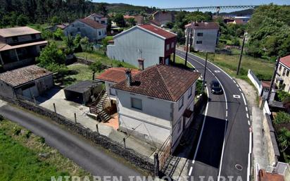 Vista exterior de Casa o xalet en venda en Catoira amb Jardí privat, Traster i Balcó