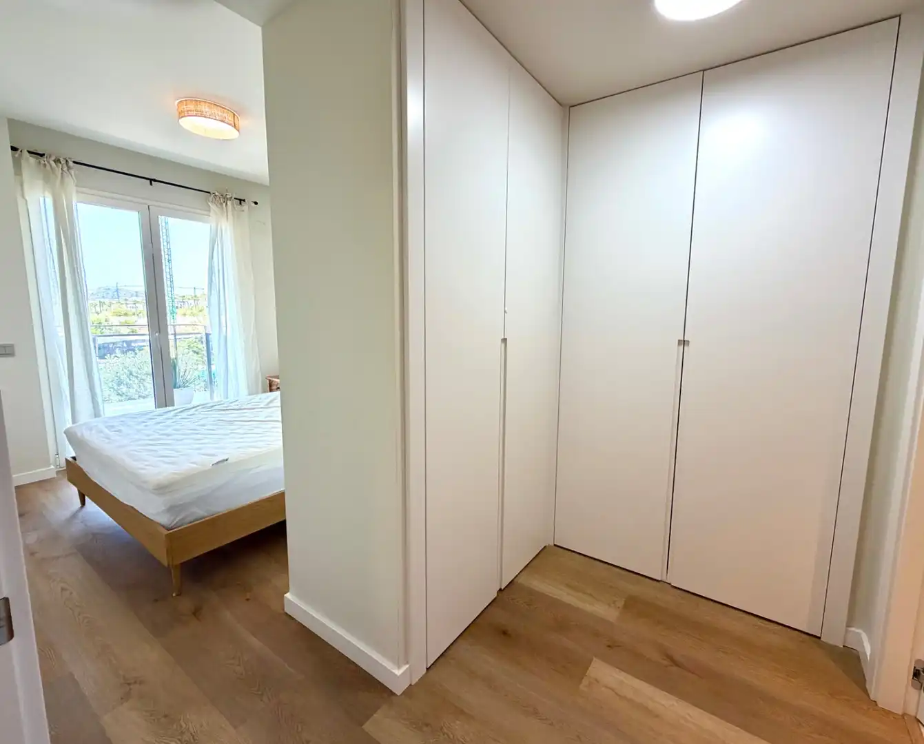 Dormitori de Apartament de lloguer en Sitges amb Aire condicionat, Calefacció i Jardí privat