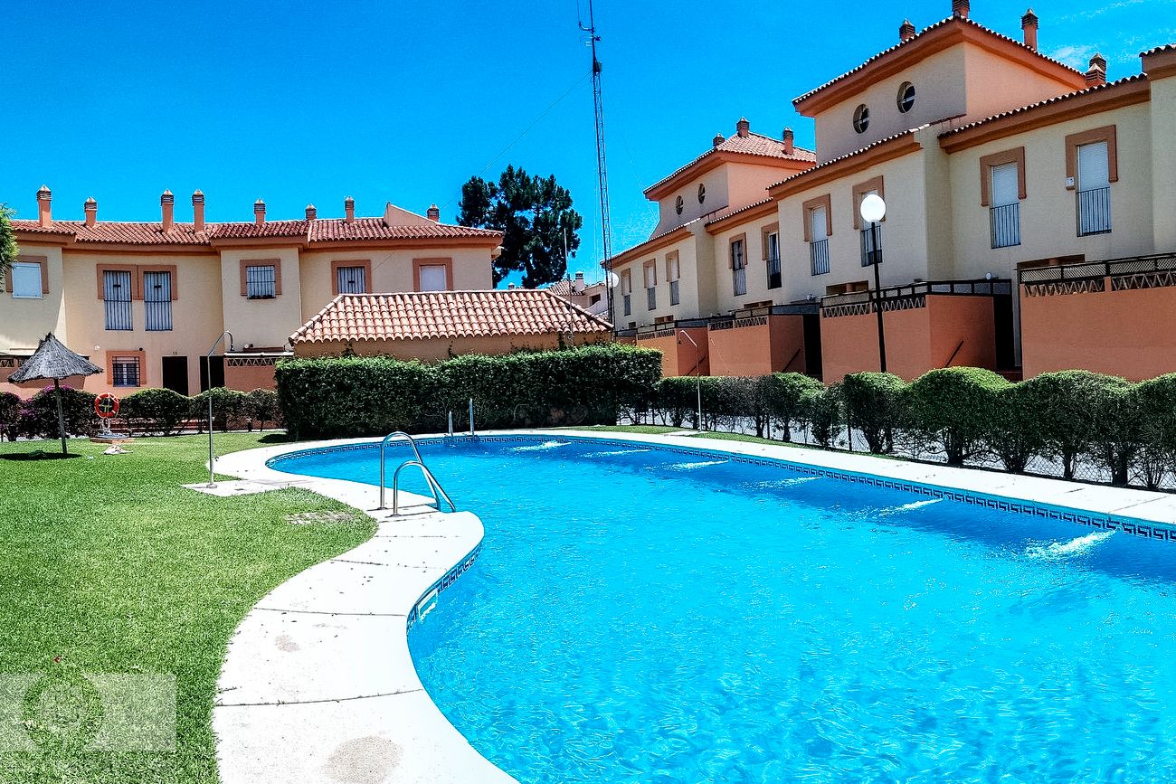 Swimming pool of Single-family semi-detached for sale in Islantilla  with Storage room and Community pool