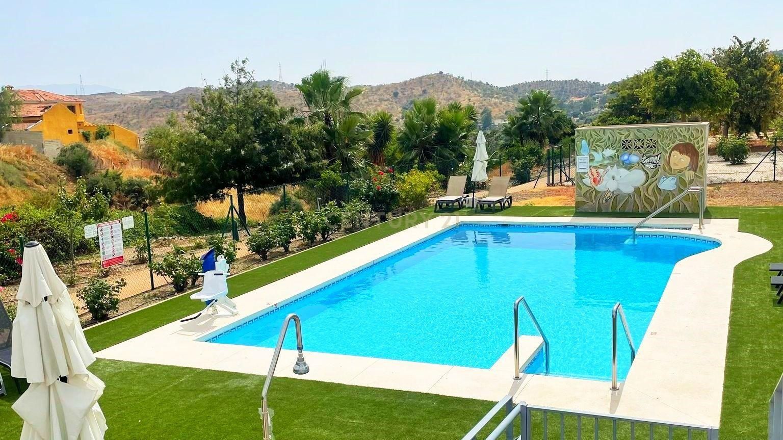 Swimming pool of Flat for sale in Málaga Capital  with Air Conditioner and Heating