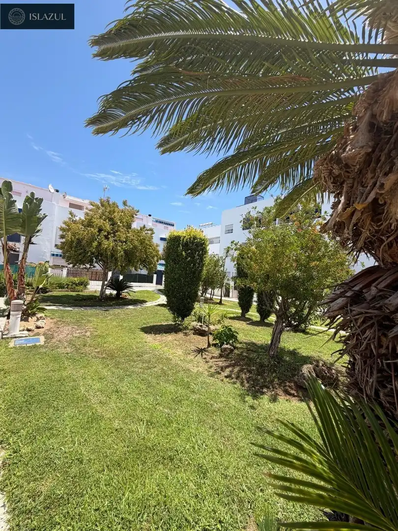Außenansicht von Maisonette zum Verkauf in Islantilla mit Klimaanlage, Heizung und Privatgarten