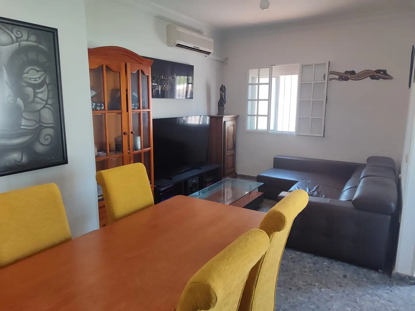 Sala d'estar de Casa o xalet de lloguer en Utrera amb Aire condicionat, Jardí privat i Terrassa