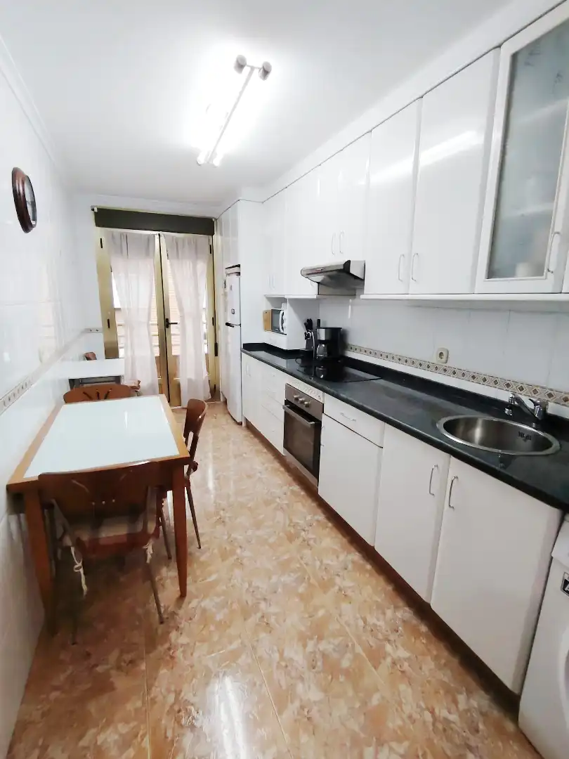 Kitchen of Flat for sale in Gijón   with Heating, Parquet flooring and Terrace