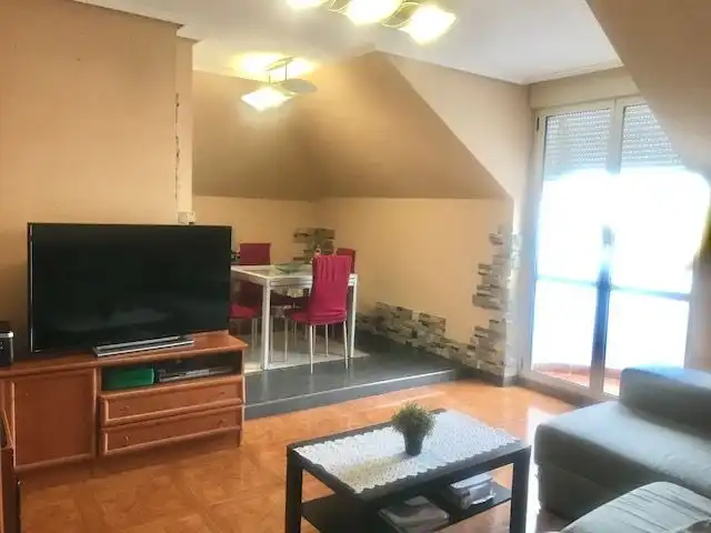 Sala de estar de Ático en venta en Noja con Calefacción, Terraza y Amueblado