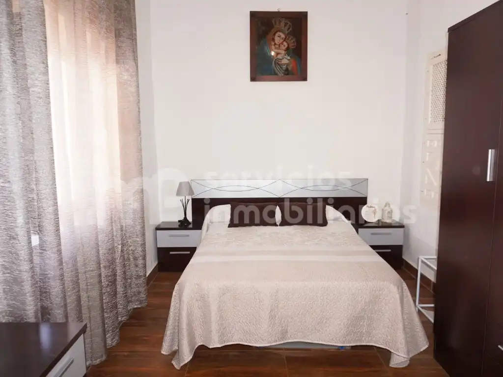 Habitación de Casa adosada en venta en Benamocarra con Jardín privado, Terraza y Amueblado