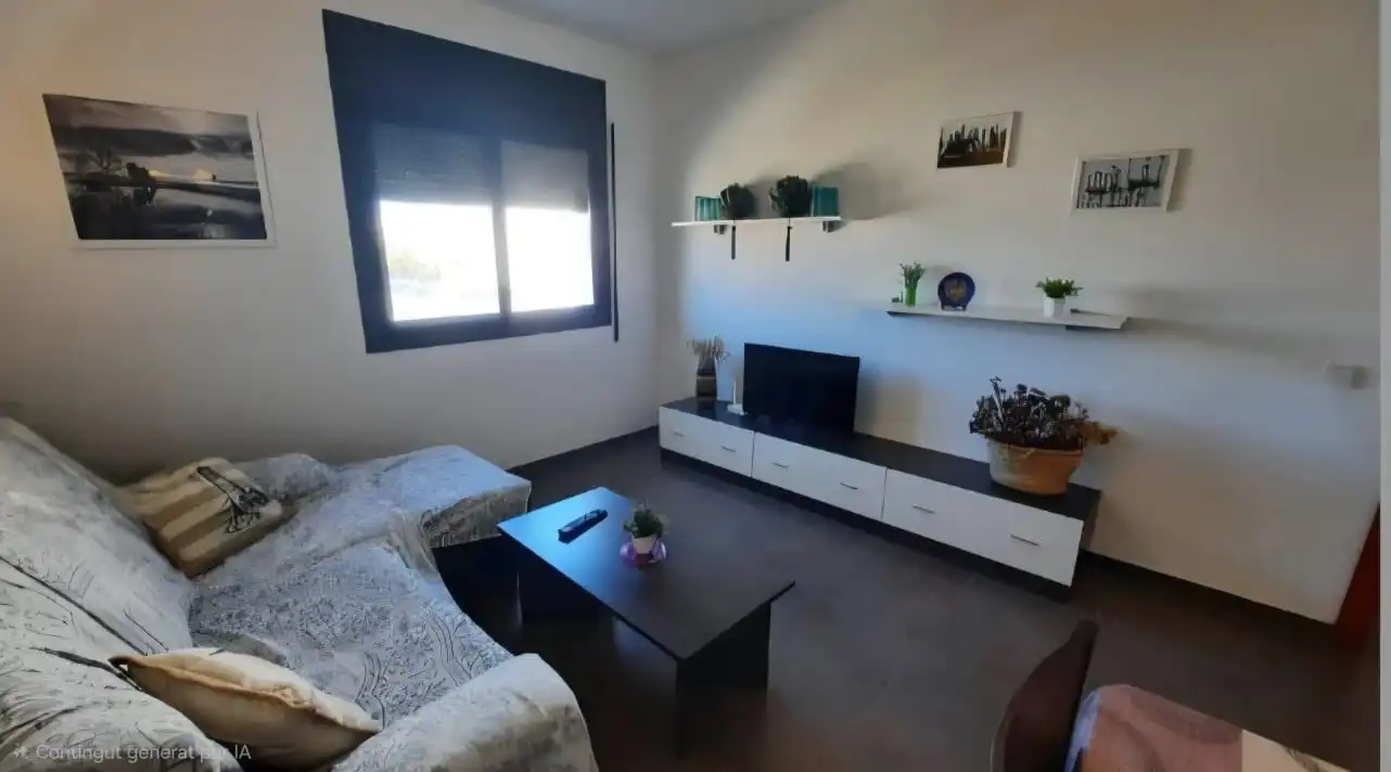 Sala de estar de Apartamento de alquiler en Sant Jaume d'Enveja con Aire acondicionado, Amueblado y Piscina comunitaria