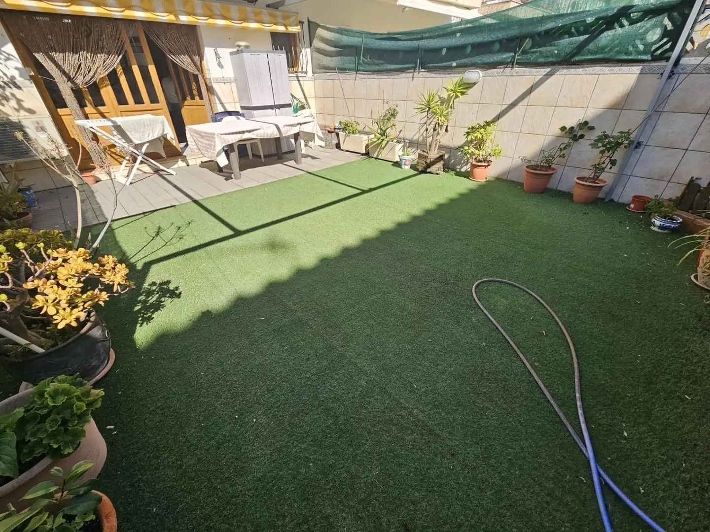 Terrasse von Einfamilien-Reihenhaus zum Verkauf in Malgrat de Mar mit Klimaanlage, Heizung und Privatgarten