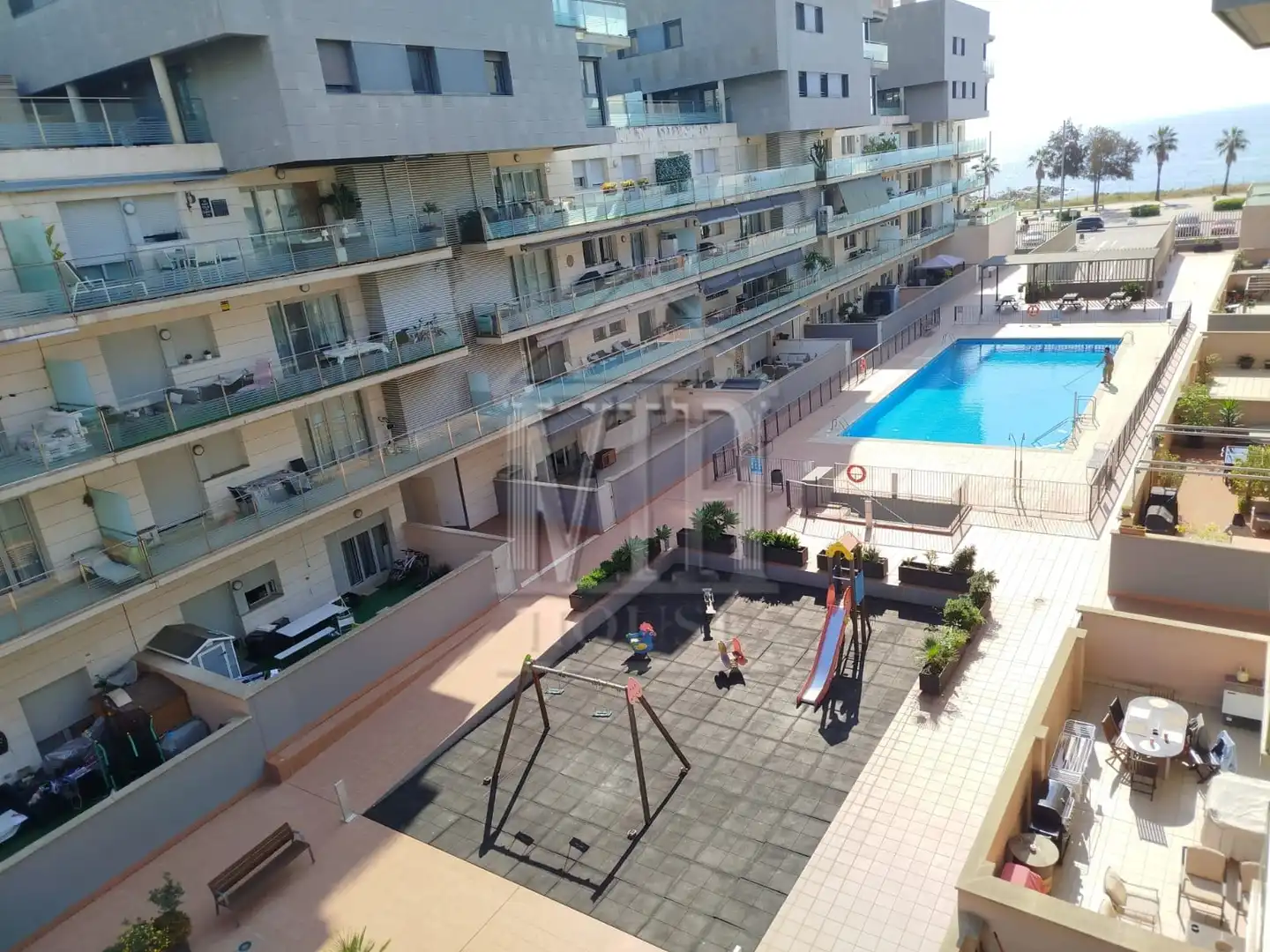 Swimming pool of Flat for sale in Badalona  with Air Conditioner, Heating and Furnished