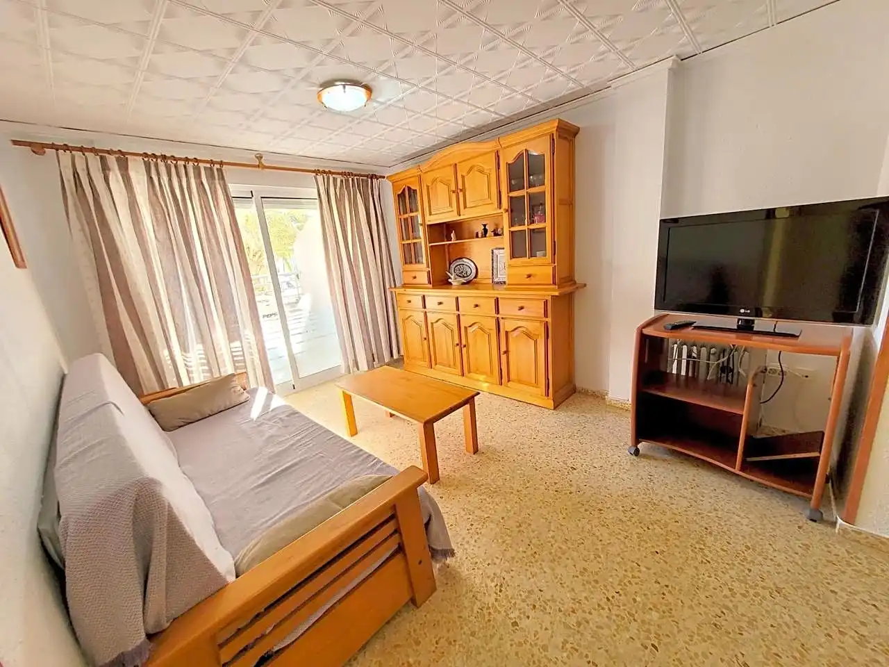Sala de estar de Apartamento de alquiler en Miramar, Valencia