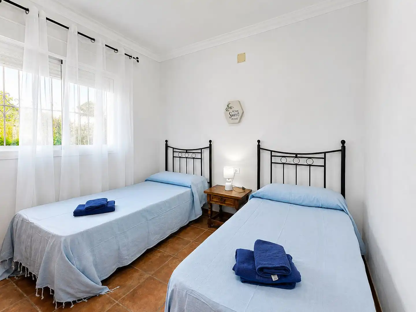 Schlafzimmer von Einfamilien-Reihenhaus zur Miete in Conil de la Frontera mit Klimaanlage, Privatgarten und Schwimmbad