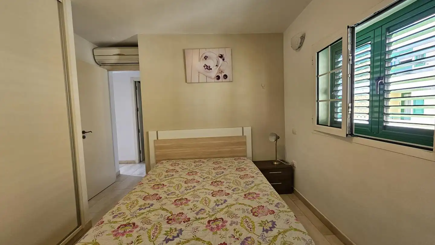 Bedroom of Flat for sale in San Bartolomé de Tirajana  with Air Conditioner, Furnished and Community pool