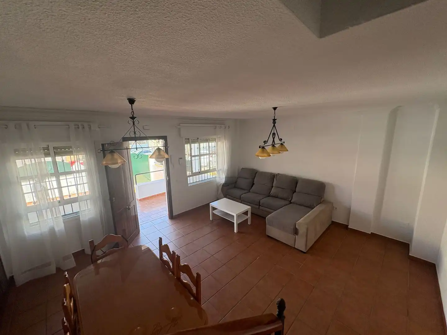 Sala d'estar de Casa o xalet de lloguer en Aljaraque amb Terrassa i Moblat