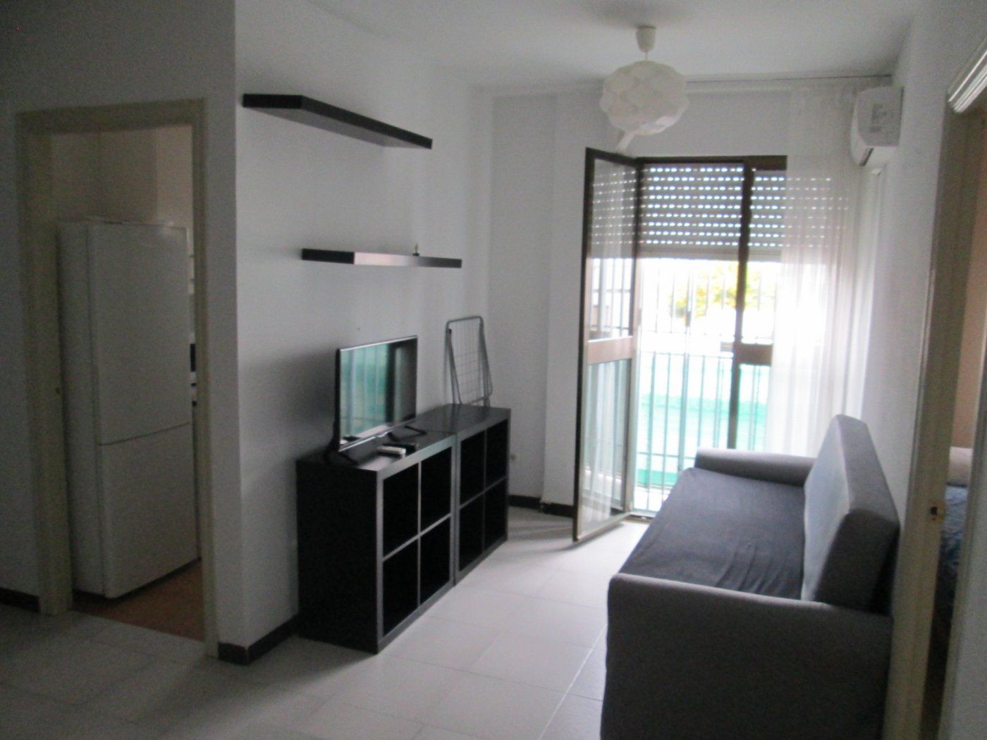 Sala d'estar de Apartament de lloguer en  Sevilla Capital amb Aire condicionat