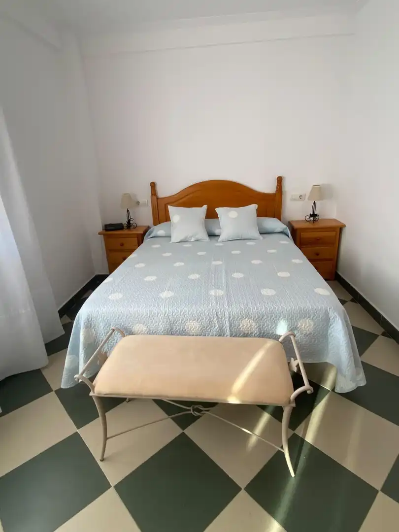 Dormitori de Pis de lloguer en Punta Umbría amb Aire condicionat, Terrassa i Moblat