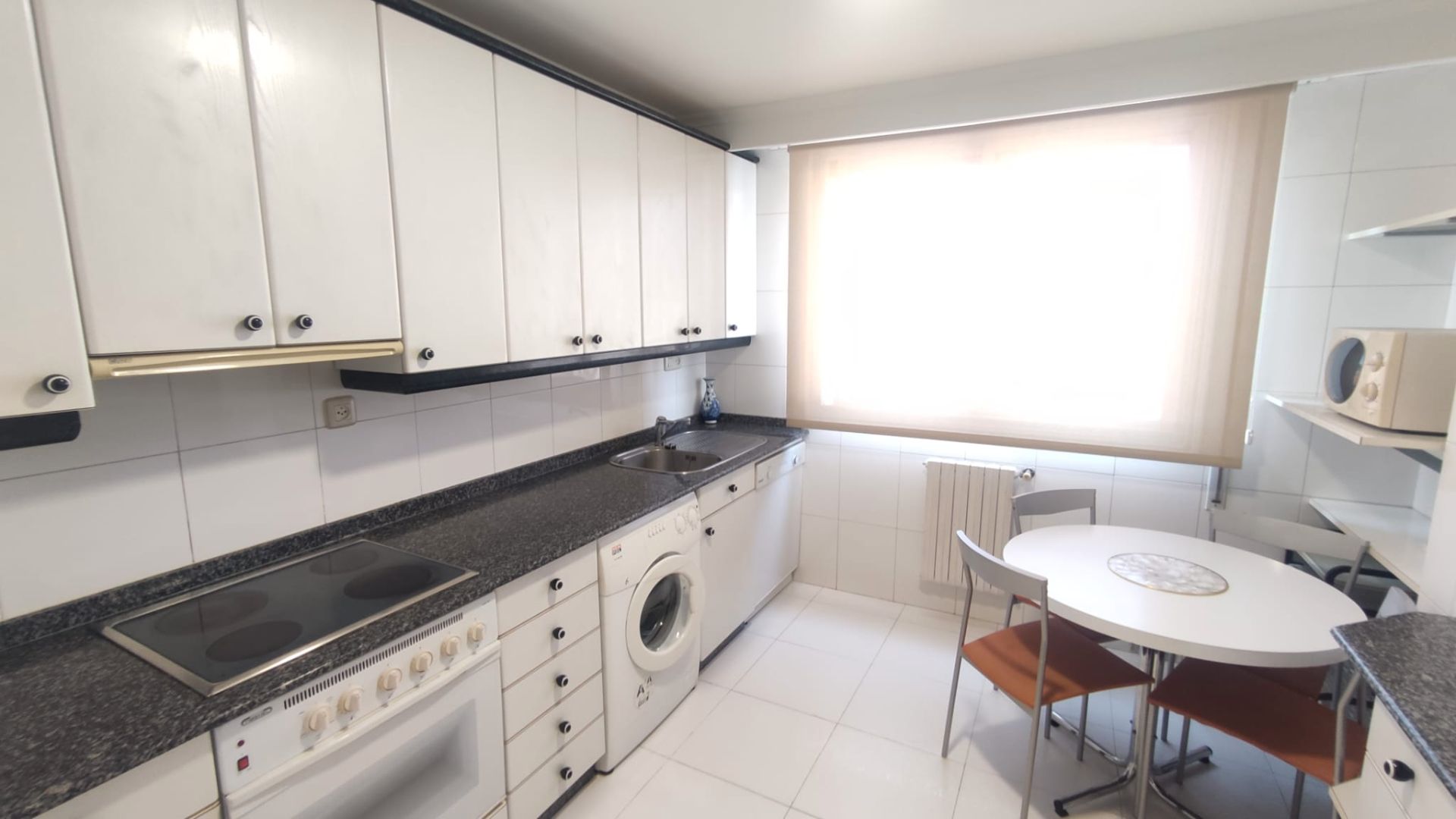 Kitchen of Flat to rent in Ourense Capital   with Heating, Parquet flooring and Furnished