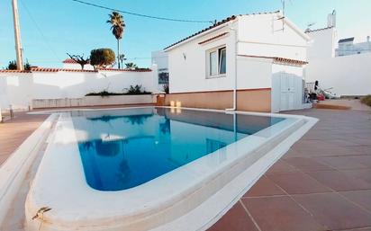 Swimming pool of Single-family semi-detached for sale in Es Castell  with Heating, Private garden and Terrace