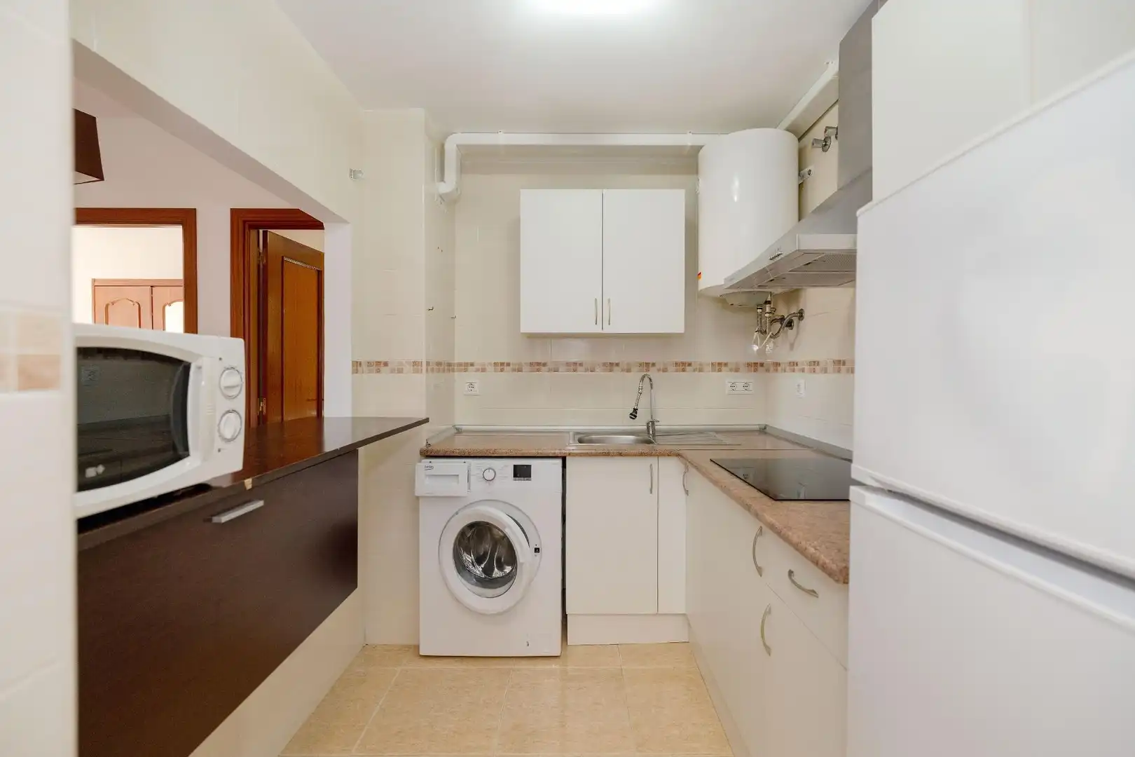Küche von Wohnung zum Verkauf in Almogía mit Klimaanlage, Terrasse und Abstellraum