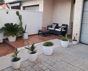 Terrassa de Casa adosada en venda en Sagunto / Sagunt amb Aire condicionat, Calefacció i Jardí privat