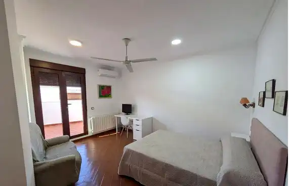 Habitación de Casa o chalet para compartir en Linares con Aire acondicionado, Terraza y Amueblado