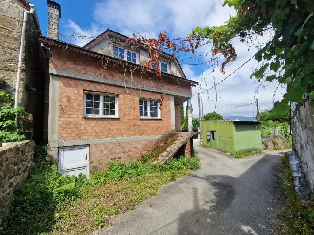 Vista exterior de Casa o xalet en venda en Rianxo amb Jardí privat, Traster i Balcó