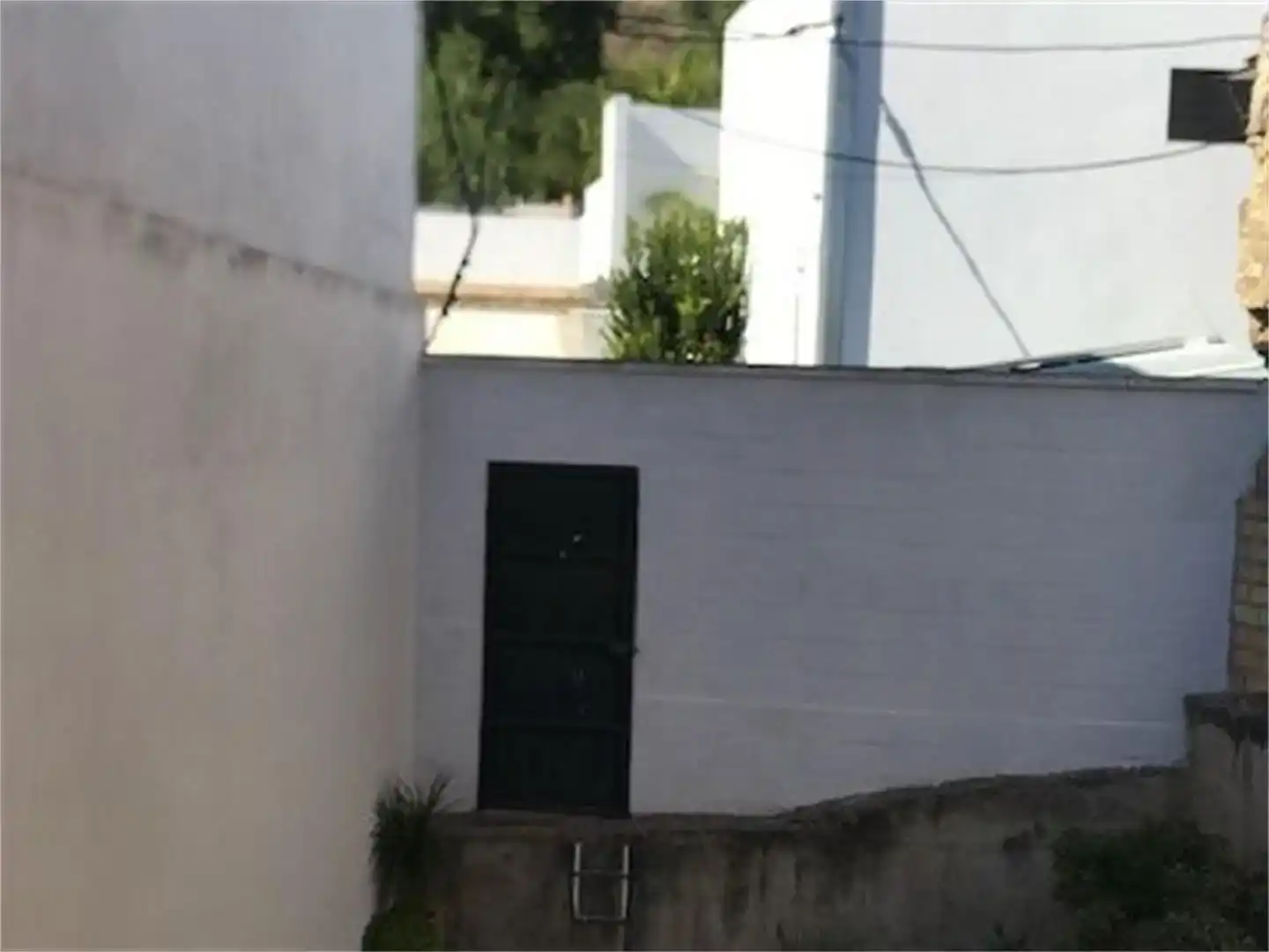 Vista exterior de Casa adosada en venda en Gelves amb Balcó