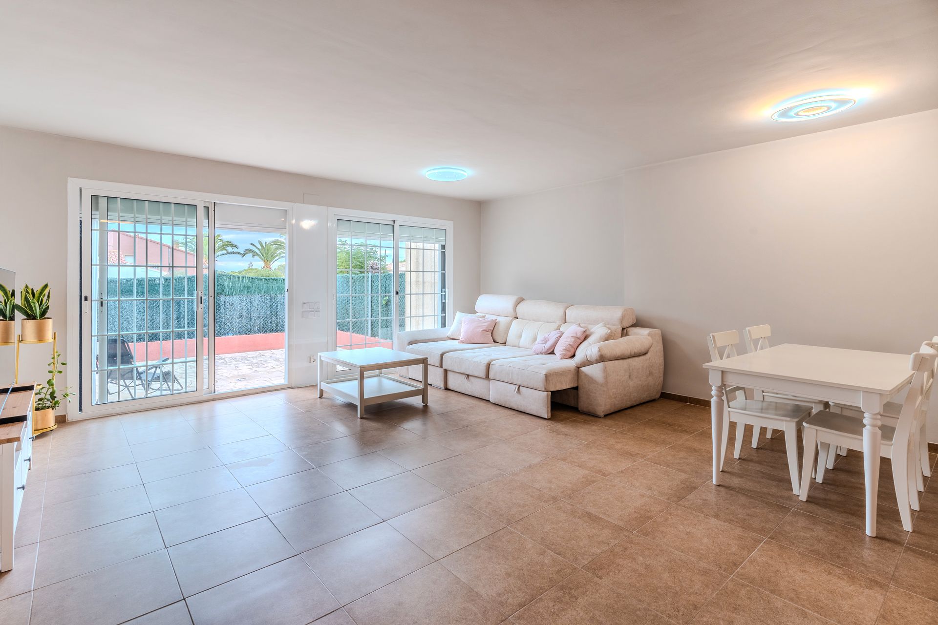 Sala d'estar de Casa adosada en venda en L'Ametlla de Mar  amb Calefacció, Jardí privat i Terrassa