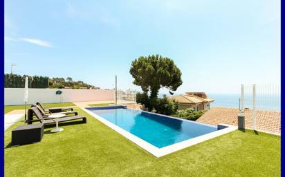 Swimming pool of House or chalet for sale in Lloret de Mar  with Air Conditioner, Terrace and Swimming Pool