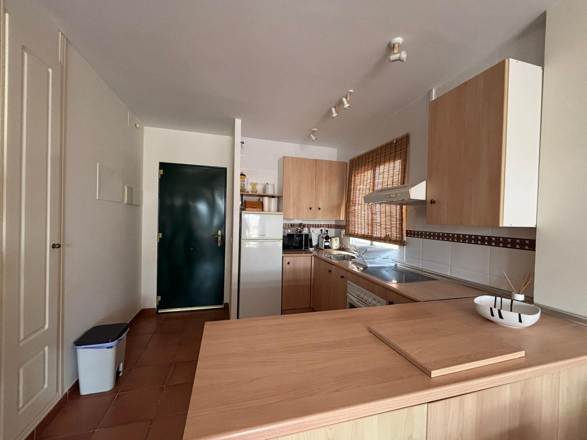Cocina de Apartamento en venta en La Alcaidesa con Jardín privado y Piscina comunitaria
