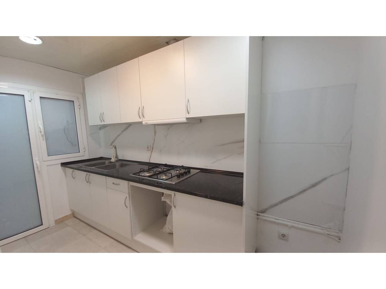 Kitchen of Flat for sale in Terrassa  with Balcony