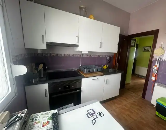 Kitchen of Flat for sale in Gijón   with Heating, Private garden and Furnished