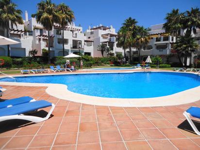 Swimming pool of Flat for sale in Marbella  with Air Conditioner, Heating and Terrace