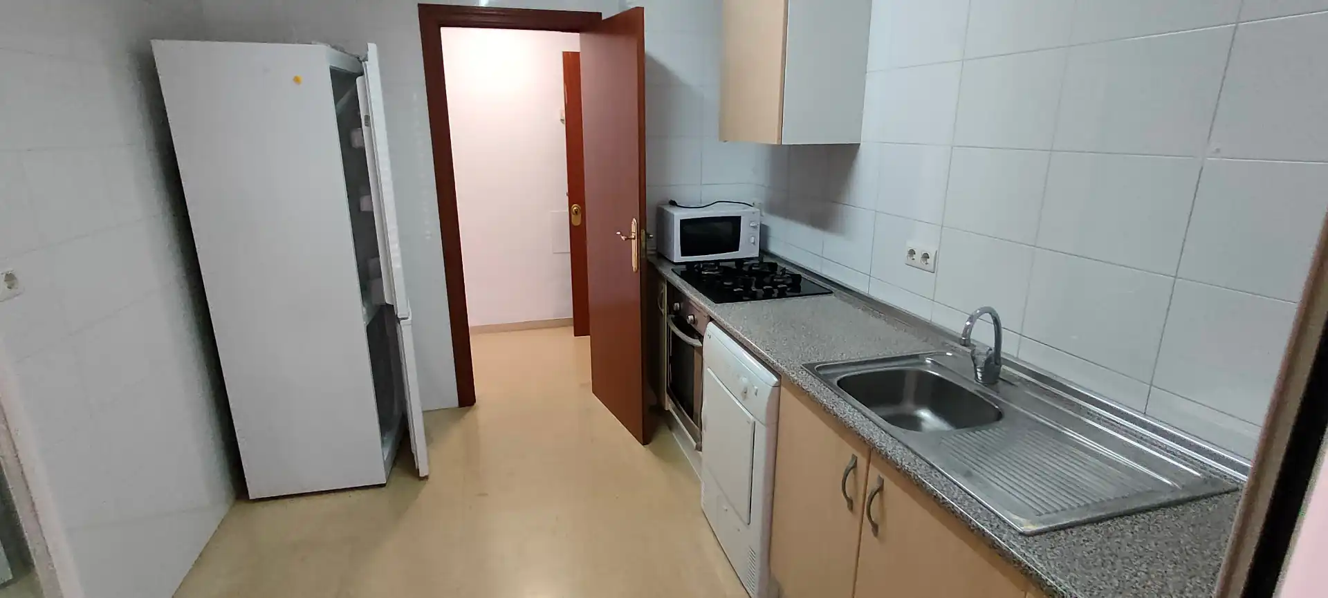 Kitchen of Flat for sale in Reus  with Air Conditioner, Heating and Storage room