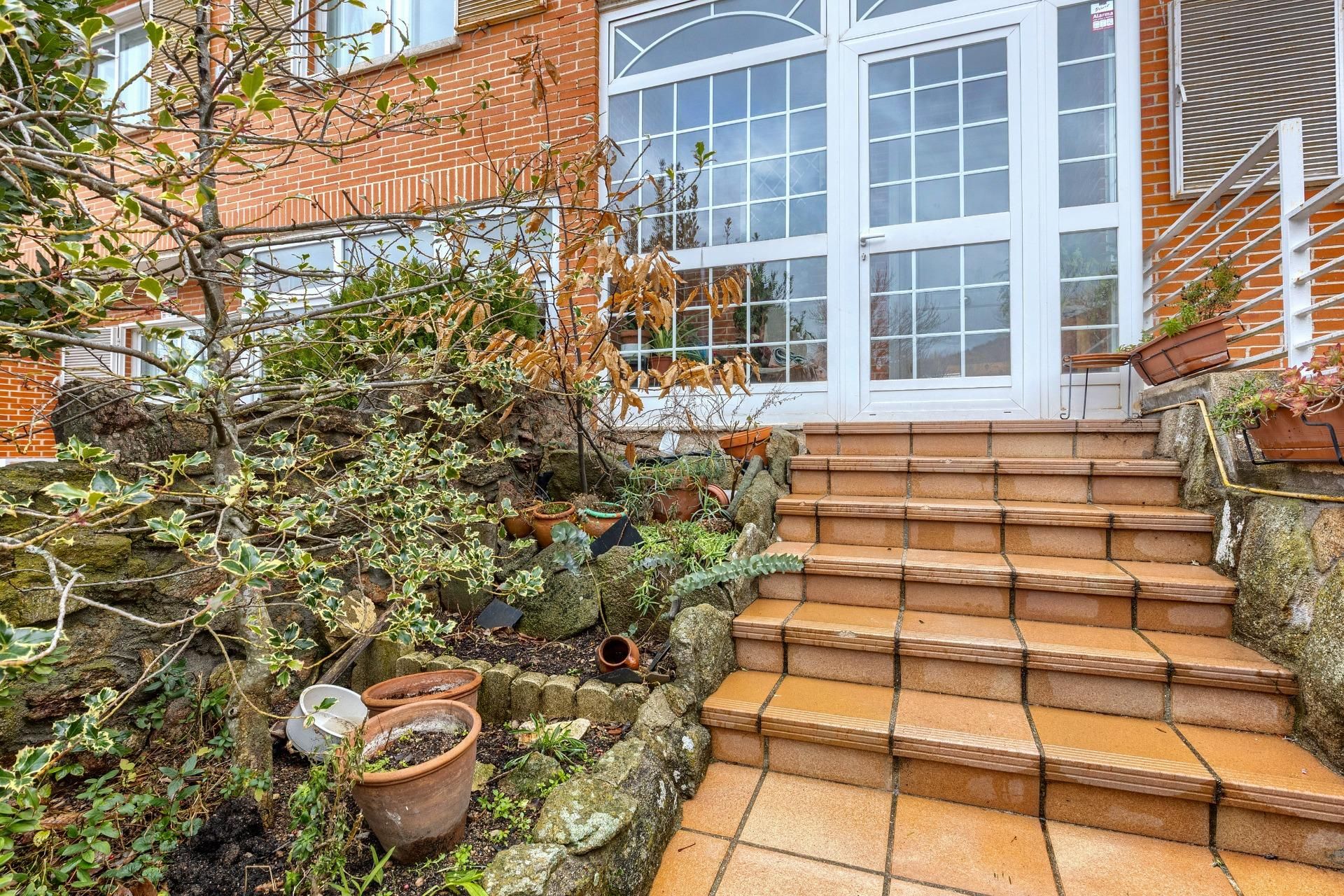 Terrassa de Casa adosada en venda en San Lorenzo de El Escorial amb Calefacció, Jardí privat i Traster