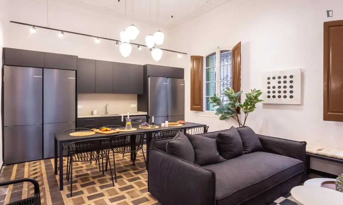 Sala d'estar de Casa o xalet per a compartir en Gràcia