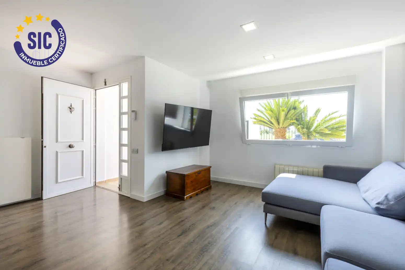 Sala de estar de Casa adosada en venta en El Puig de Santa Maria con Aire acondicionado, Calefacción y Jardín privado