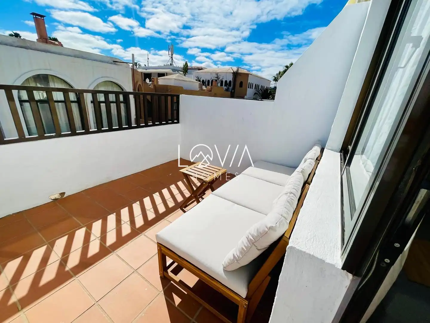 Terrassa de Apartament de lloguer en La Oliva amb Terrassa, Piscina i Piscina comunitària