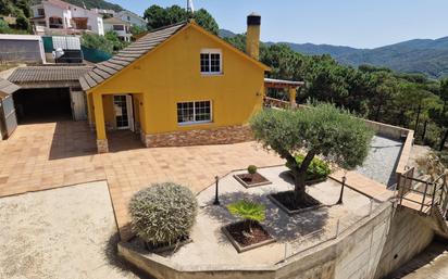 Exterior view of House or chalet for sale in Dosrius  with Air Conditioner