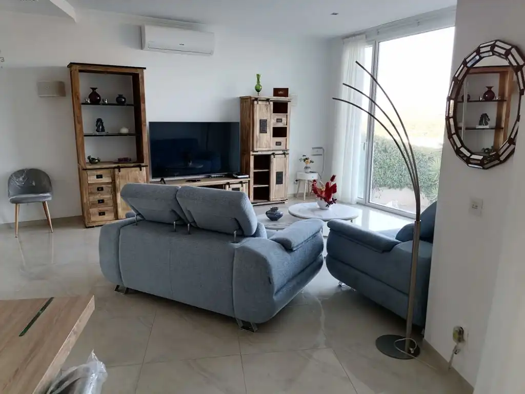 Sala d'estar de Casa o xalet de lloguer en Calvià amb Aire condicionat, Jardí privat i Terrassa