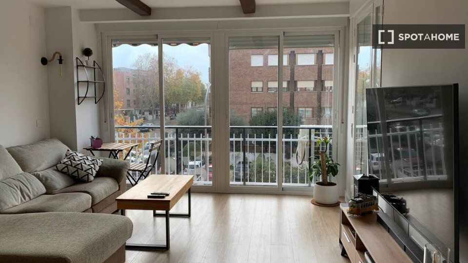 Sala de estar de Piso de alquiler en  Madrid Capital con Aire acondicionado, Calefacción y Amueblado