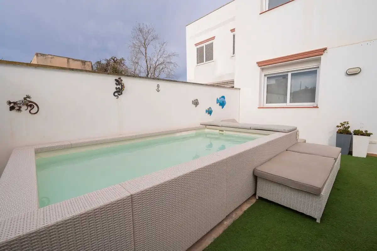 Piscina de Casa adosada en venta en Sant Antoni de Portmany con Aire acondicionado, Calefacción y Jardín privado